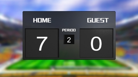 soccer match scoreboard display the goal result with out focus stadium backgroundの写真素材