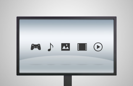 entertainment icon is showing on the monitor display, it is representing the selection of entertainment applicationの写真素材
