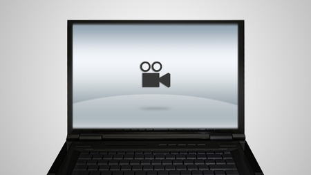 movie icon is showing on the monitor display, it is representing the selection of entertainment applicationの写真素材