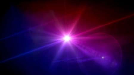 magenta and purple color star lens flare special effectの写真素材