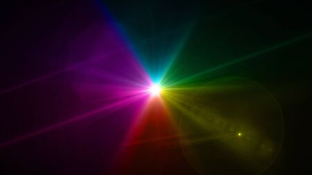 color light with lens flare. Glowing streaks overlay on dark background.の写真素材