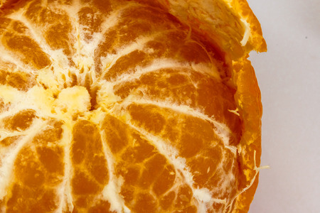 Ripe and fresh mandarin isolated on white background. Close-up, macro. Citrusの写真素材