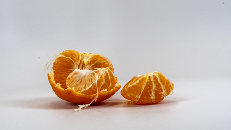 Ripe and fresh mandarin isolated on white background. Close-up, macro. Citrusの写真素材