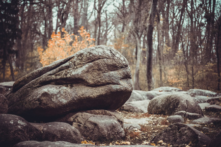 The huge ancient stones in forest. National park Sofiivka, Uman, Ukraine. Interesting and unusual travels in Europeの写真素材