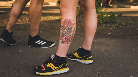 05.16.2019 - Kiyv, Ukraine: Tattoo festival. Millennials with tattoo on them body are coming on the Tatto Collection festival. Happy young personのeditorial素材