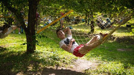 Kyiv, Ukraine - 07.09.2019: Atlas Weekend music festival outdoors, first day. Millennials are relaxin at music festival. People are dancing in the open sky.のeditorial素材