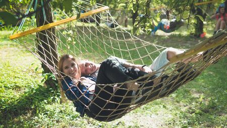 Kyiv, Ukraine - 07.09.2019: Atlas Weekend music festival outdoors, first day. Millennials are relaxin at music festival. People are dancing in the open sky.のeditorial素材