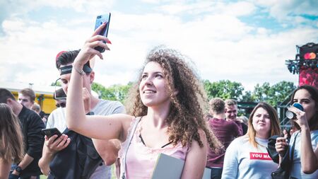 Kyiv, Ukraine - 07.09.2019: Atlas Weekend music festival outdoors, first day. Millennials are...