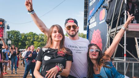 Kyiv, Ukraine - 07.13.2019: Atlas Weekend music festival outdoors, fifth day. Millennials are relaxin at music festival. People are dancing in the open sky.のeditorial素材