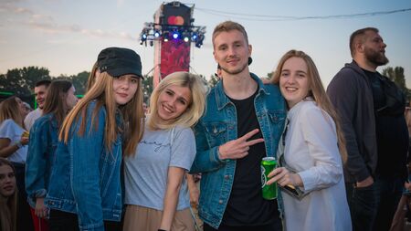 Kyiv, Ukraine - 07.13.2019: Atlas Weekend music festival outdoors, fifth day. Millennials are relaxin at music festival. People are dancing in the open sky.のeditorial素材