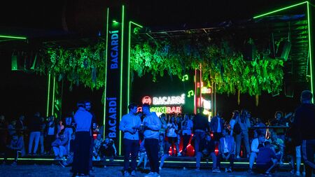 Kyiv, Ukraine - 07.13.2019: Atlas Weekend music festival outdoors, fifth day. Millennials are relaxin at music festival. People are dancing in the open sky.のeditorial素材