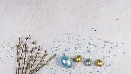 colorful quail eggs on grey background, flat lay. Concept of Easter holiday and spring. Copy space, top viewの写真素材