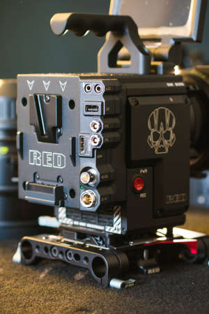Kyiv, Ukraine - 04.17.2020: Studio shoot of professional 5k video camera Red DSMC2 with lens, close-up. Professional equipment for cinematographer, movie technologyのeditorial素材
