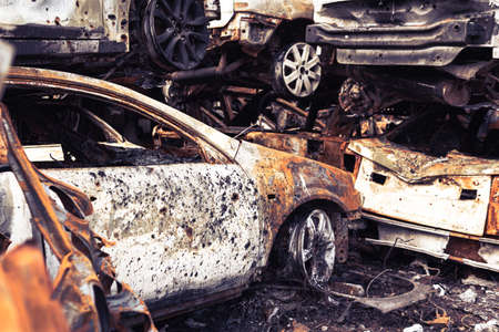 Irpin, Kyiv region, Ukraine - 28 April 2022: Car graveyard in Irpin, consequences of the invasion of...