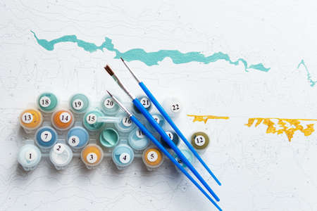 A set of colorful gouache for painting by numbers, drawing on canvas. Concepts of leisure activity,...