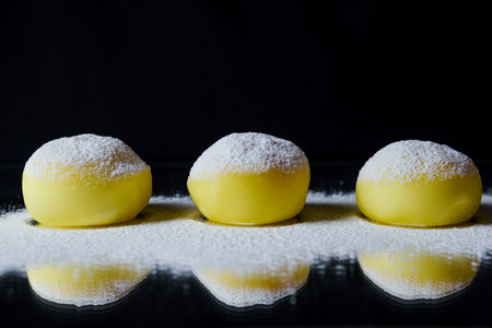 Tasty dessert Mochi on black background, close up. traditional japanese rice cake dessertの写真素材