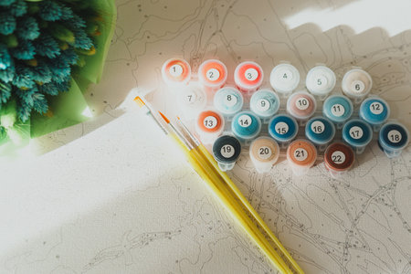A set of colorful gouache for painting by numbers, pastel colors, drawing on canvas. Concepts of leisure activity, hobby and relax. selective focus. close up.の写真素材