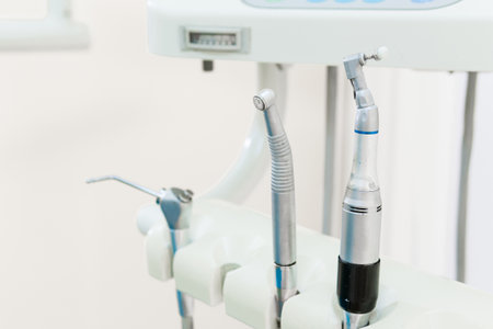 Dentist workspace with modern chair, equipment and instruments. Technologies in dentistry. Dental care and oral hygiene conceptの写真素材