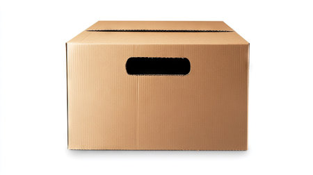 A large cardboard box with handles cut out on the sides, isolated on a bright white backgroundの素材