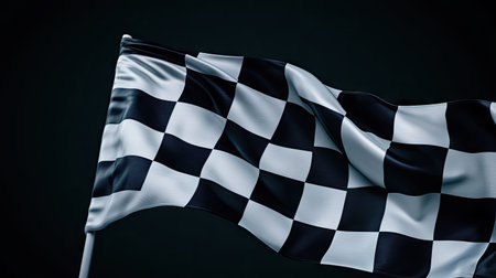 Racing checkered flag waving against a dark background, symbolizing victory and competition in motorsportsの素材