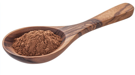 A wooden spoon filled with rich cocoa powder, isolated on a clean white background with no distractions.の素材