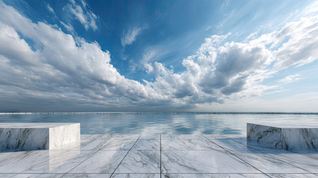 A wide shot of a serene marble platform beneath a tranquil sky with drifting white cloudsの素材
