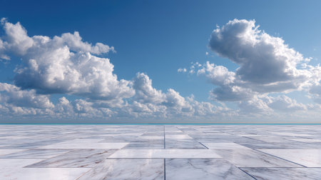 Smooth white marble floor extending toward the horizon, set against a peaceful sky filled with fluffy white cloudsの素材