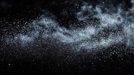 Fine mist of water spray illuminated against black background, showcasing texture and movement in high-speed photographyの素材