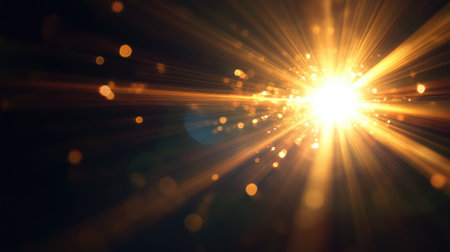 Warm natural sun flare bursting through a dark black background, creating vibrant rays and lens flare effects for dramatic lightingの素材