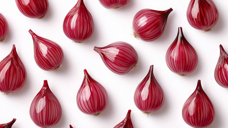 Whole red onions arranged with precision on a plain white background, highlighting their natural sheen.の素材