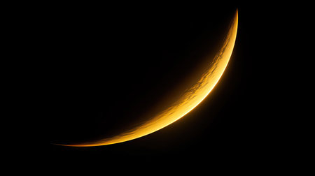 A soft, warm sun flare with gentle yellow hues, casting a subtle glow against a black void.の素材