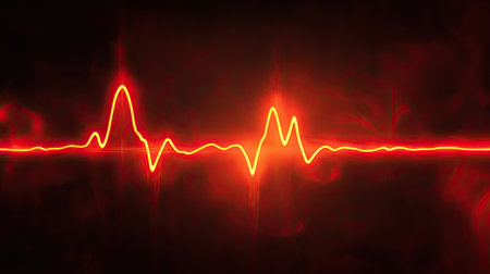 A glowing red heart rate line forming a perfect heartbeat pattern on a dark background.の素材