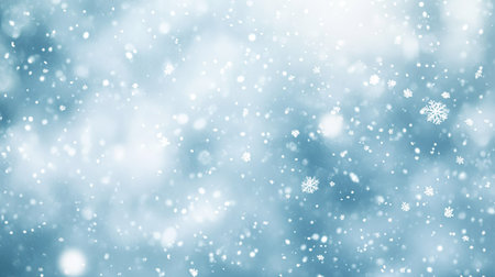 Gentle snowflakes fall softly in a tranquil blue setting, evoking a peaceful winter ambiance perfect for holiday designs, invitations, or seasonal projects.の素材