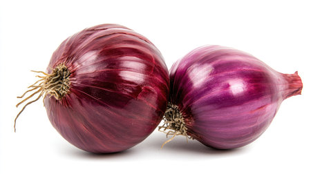A single red onion with vibrant purple skin, isolated on a pristine white background, showing its glossy texture.の素材