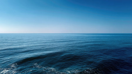 Clear view of the horizon over the sea with no obstructions, showcasing a seamless line where the ocean meets the skyの素材