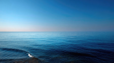 Clear view of the horizon over the sea with no obstructions, showcasing a seamless line where the ocean meets the skyの素材