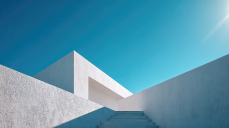 Close-up of a white concrete structure with dramatic sunlight and rich blue sky, minimalist urban aestheticの素材
