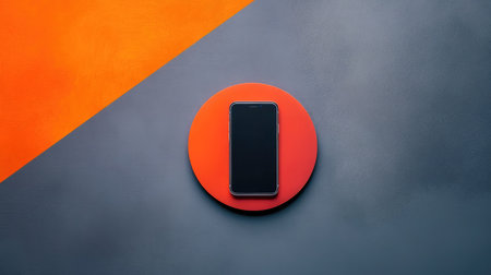 Wireless smartphone charging pad with a phone placed perfectly centered, minimalistic backgroundの素材