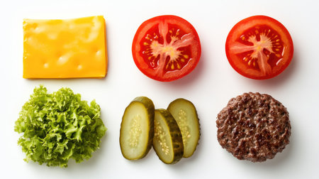 Cheeseburger ingredients including cheddar slice, pickles, tomato, and beef patty on a white backgroundの素材