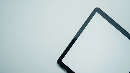 A close-up of a tablet with a blank screen on a white background, ready for app or website mockupsの素材