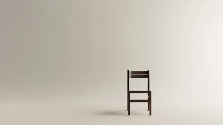 A single chair placed on an infinite white background, creating a sense of space and minimalismの素材