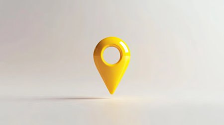 Minimalistic yellow location marker pin floating above a white surface, perfect for mobile navigation or travel appsの素材