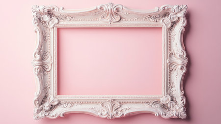 A beautiful vintage frame in soft pink tones, ideal for displaying artwork or photographs. The intricate design adds elegance to any interior space or decor style.の素材