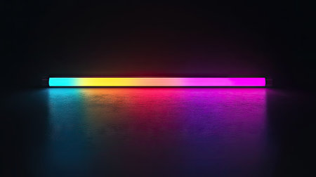 This image showcases a sleek neon light bar featuring a colorful gradient against a dark background, perfect for adding modern elegance to digital projects and creative designs.の素材