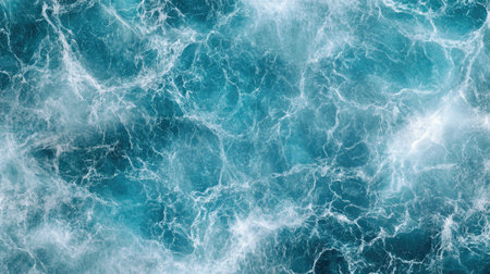 Elegant marble texture with deep and soft ocean blue hues, creating a calming, water-like effect with white lines and swirlsの素材