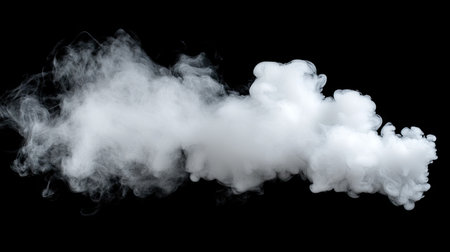 Delicate white smoke puff rising slowly on a black background, with soft, swirling tendrils and a calm, mysterious ambiance.の素材