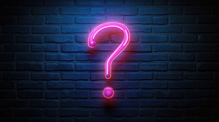 A glowing neon question mark symbol on a dark brick wall, creating a mysterious atmosphereの素材