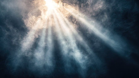 A dramatic spotlight illuminating a smoky atmosphere, with light rays breaking through the hazeの素材