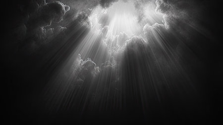 Vertical rays of light fanning out from a central point on the top of the frame, breaking through the dark atmosphere in vivid contrast.の素材