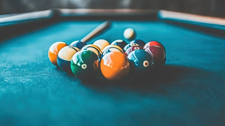 A close-up of snooker balls perfectly racked at the center of the table, with the cue ball positioned to break.の素材